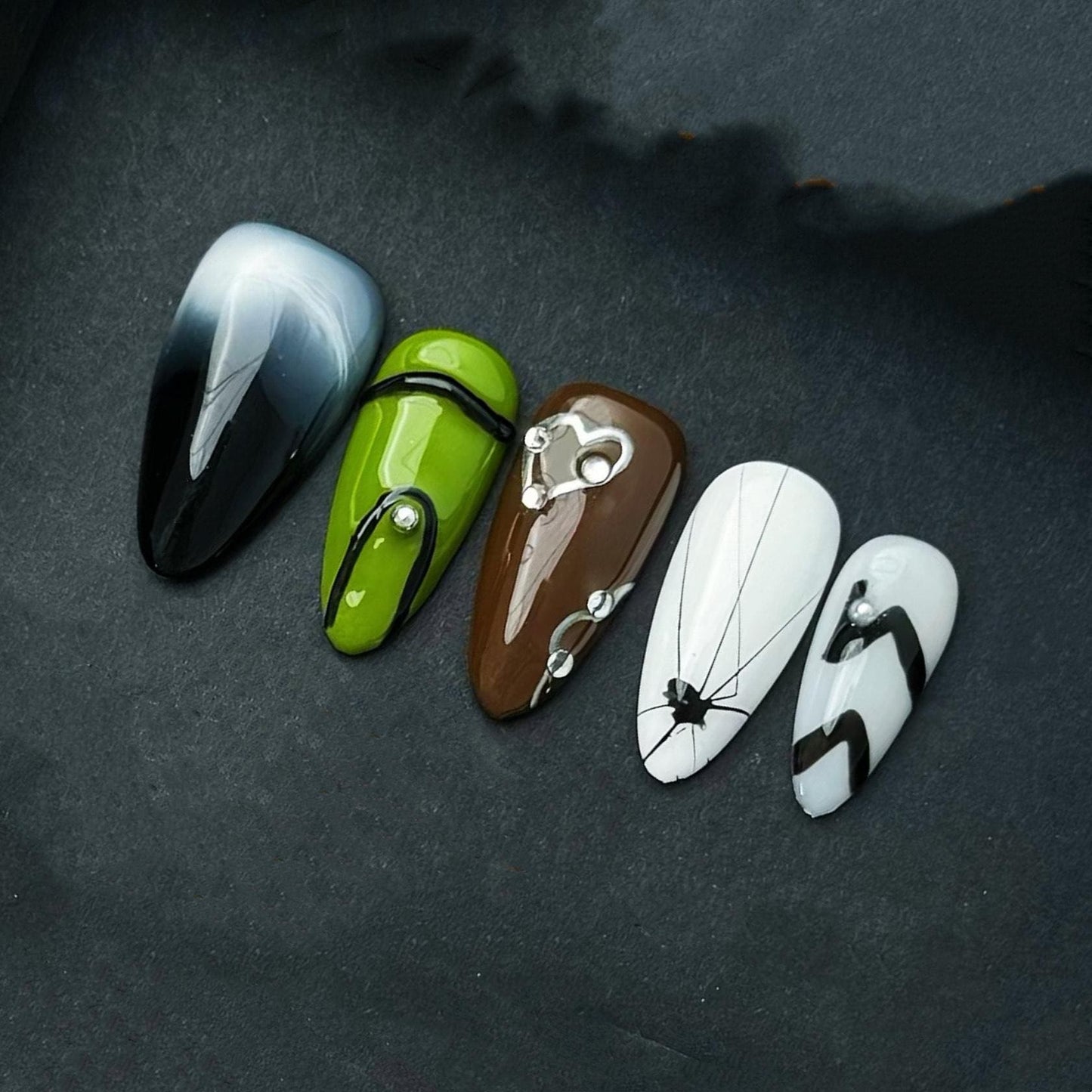 Edgy Mixed Design Nails Black Ombre Green Brown Spider Web and Abstract Accents. Artificial reusable fake glue on faux manicure nails art.