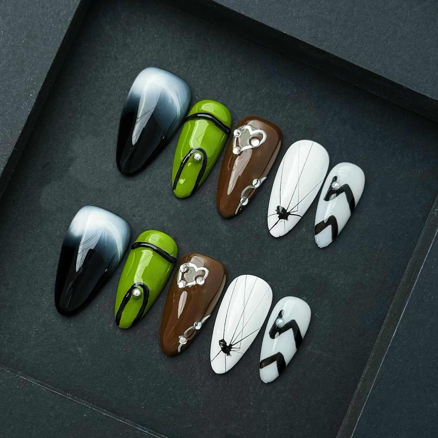 Edgy Mixed Design Nails Black Ombre Green Brown Spider Web and Abstract Accents. Artificial reusable fake glue on faux manicure nails art.