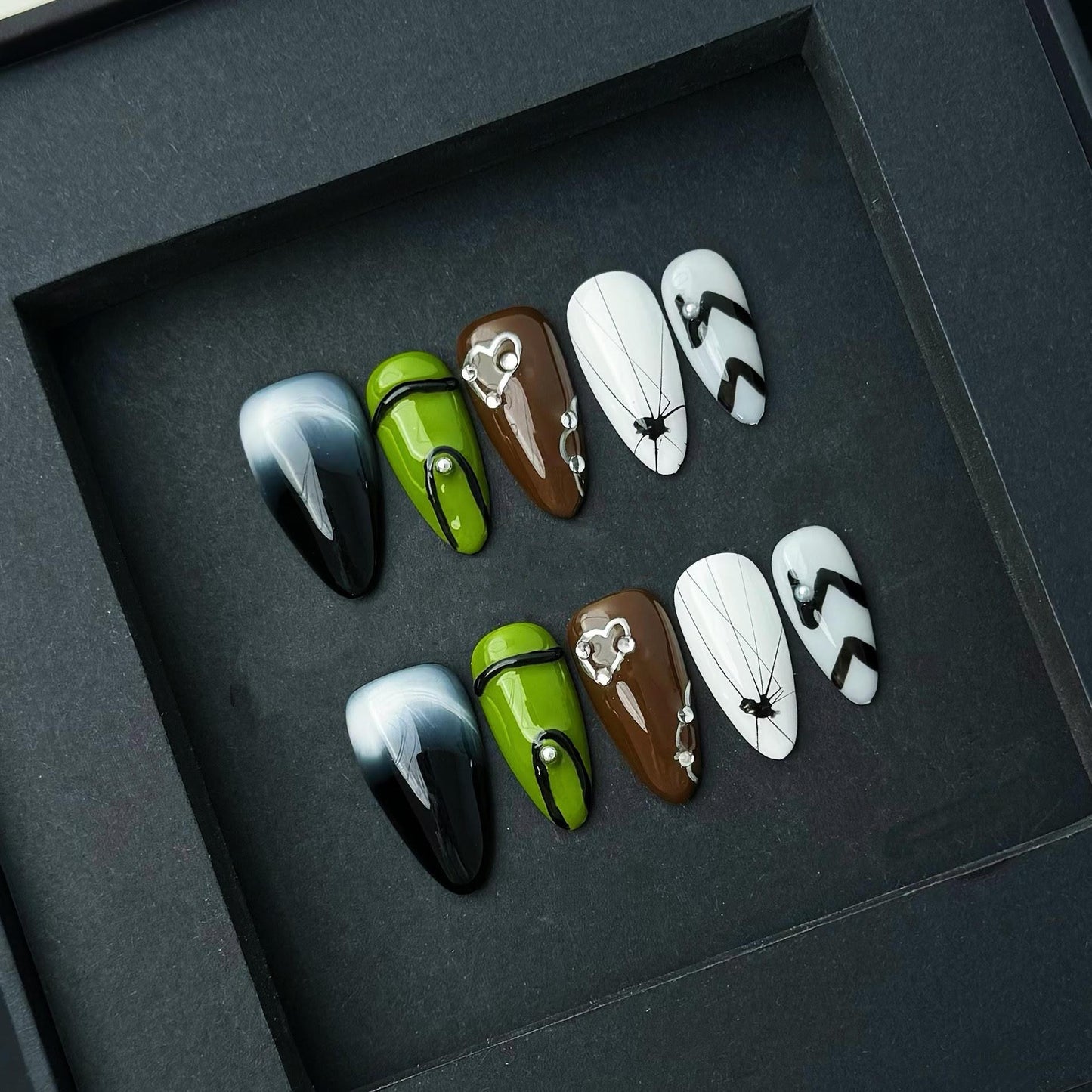 Edgy Mixed Design Nails Black Ombre Green Brown Spider Web and Abstract Accents. Artificial reusable fake glue on faux manicure nails art.