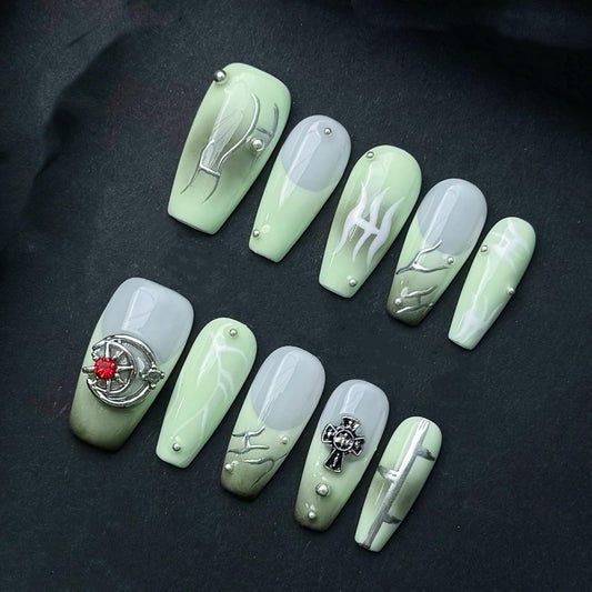 Sage Green and Gray Press On Nails with Tribal Art Cross Charm and Chrome Accents. Artificial reusable fake glue on faux manicure nails art.