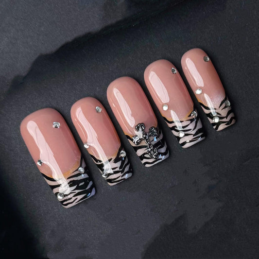 Zebra French Tip Press On Nails with Rhinestones and Gothic Cross Accent Artificial reusable fake glue on faux manicure nails trendy art