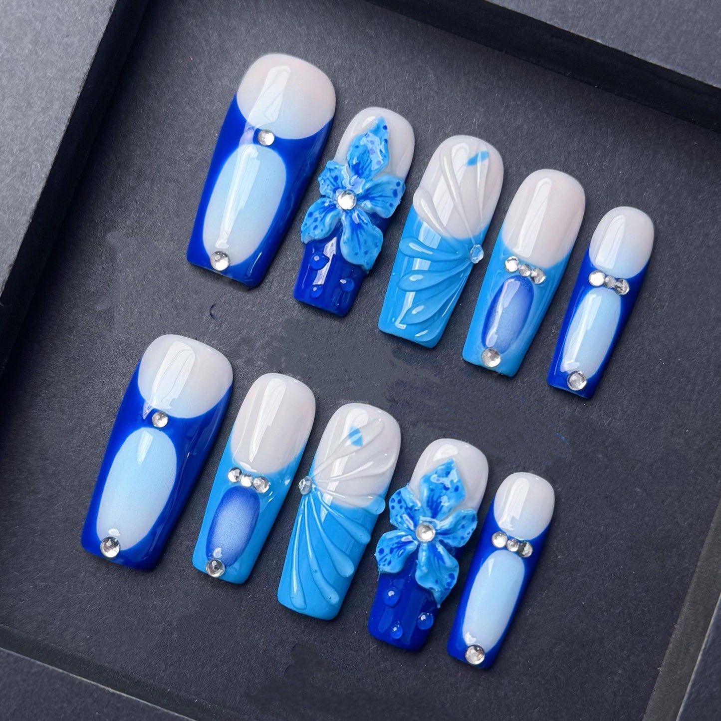 Blue Blossom Press-On Nails with Rhinestones and 3D Floral Accents. Artificial reusable fake glue on faux manicure nails trendy art.