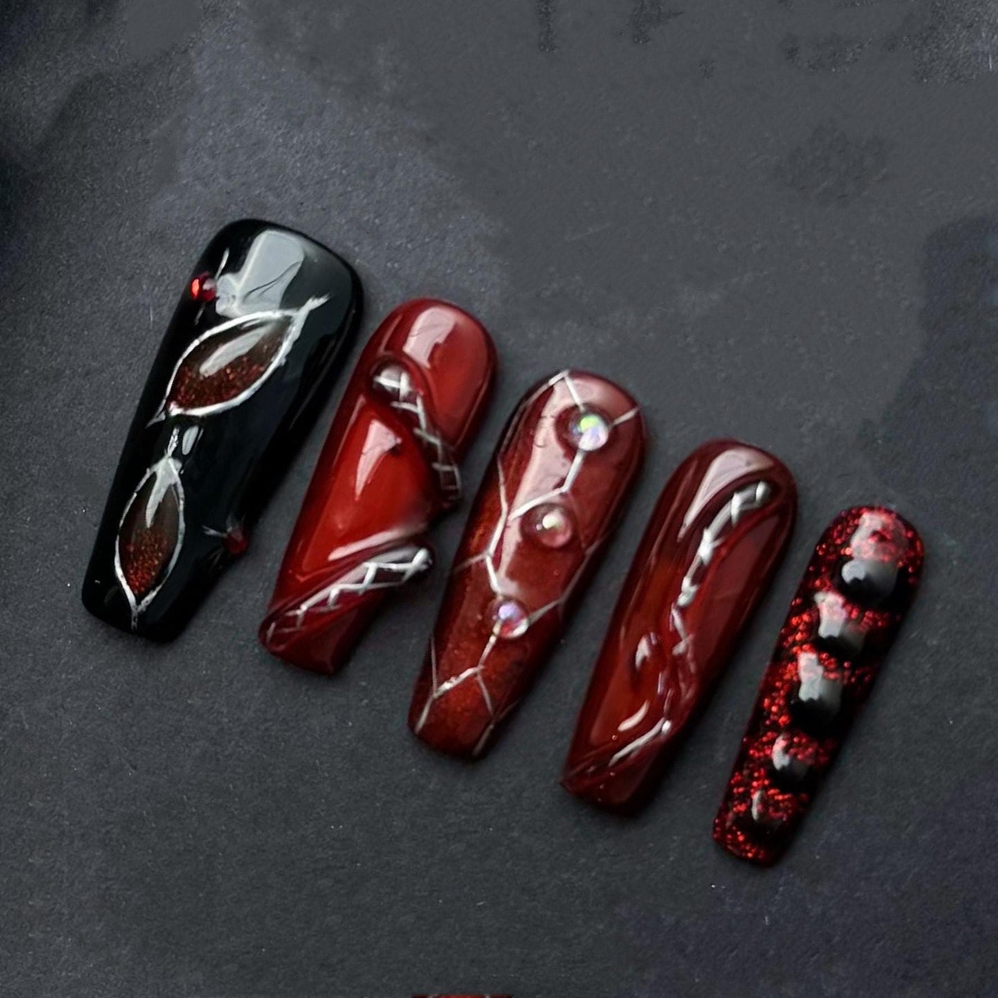 Deep Red and Black Gothic Press-On Nails with Chrome & Crystal Accents. Artificial reusable fake glue on faux manicure nails trendy art.