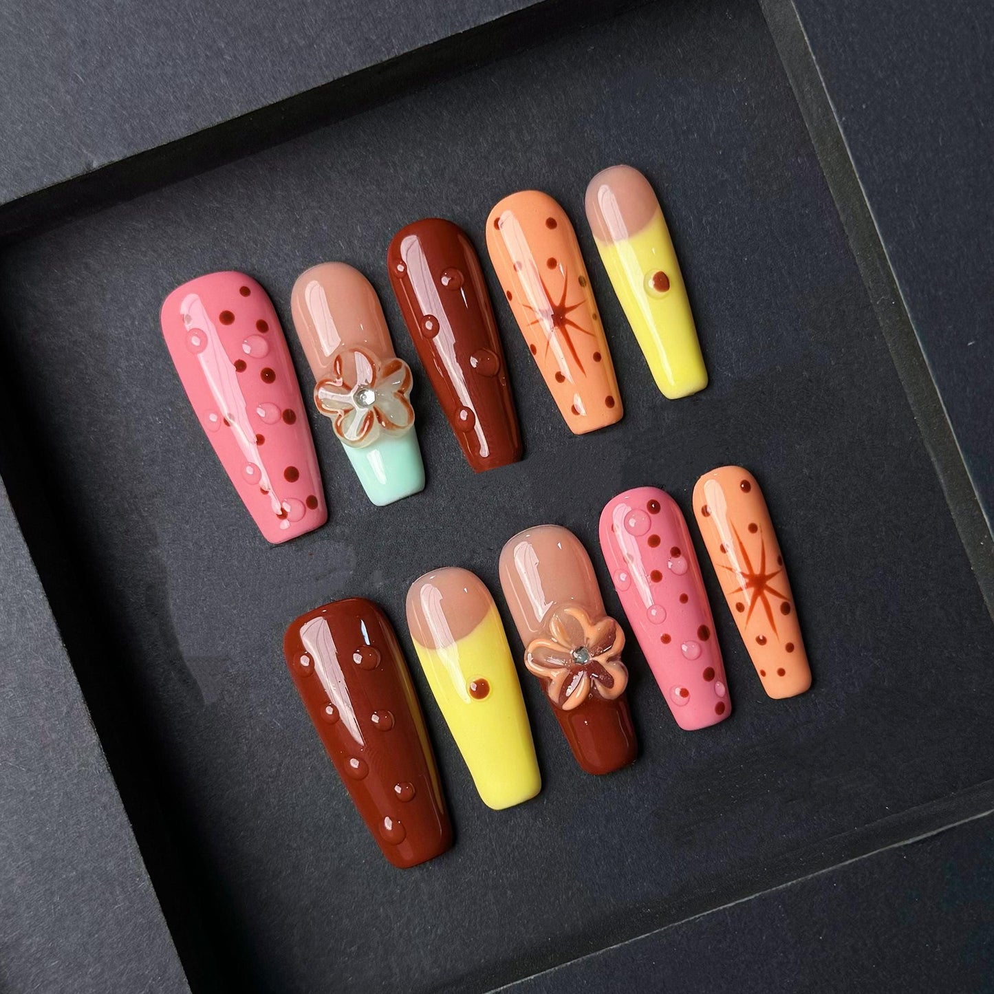 Retro Polka Dot Press-On Nails with 3D Flower and Sunset Tones. Artificial reusable fake glue on faux manicure nails trendy art.
