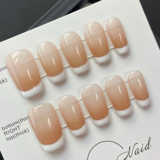 Classic French Tip Nude Press-On Nails – Short Square Shape. Artificial reusable fake glue on faux manicure nails trendy art.