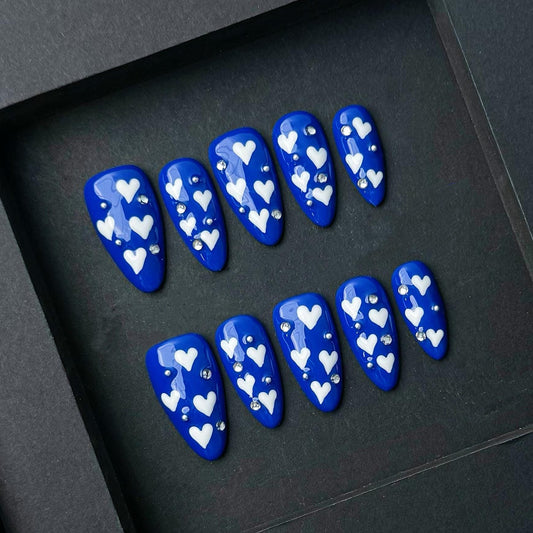 Royal Blue Press-On Nails with White Heart and Rhinestones Bold & Romantic. Artificial reusable fake glue on faux manicure nails trendy art.