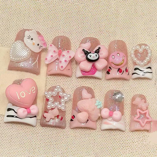 Kawaii Pink Press On Nails with Hello Kitty & Cartoon Charms – Cute 3D Heart Bow Glitter Nail Art. Artificial reusable manicure trendy art.