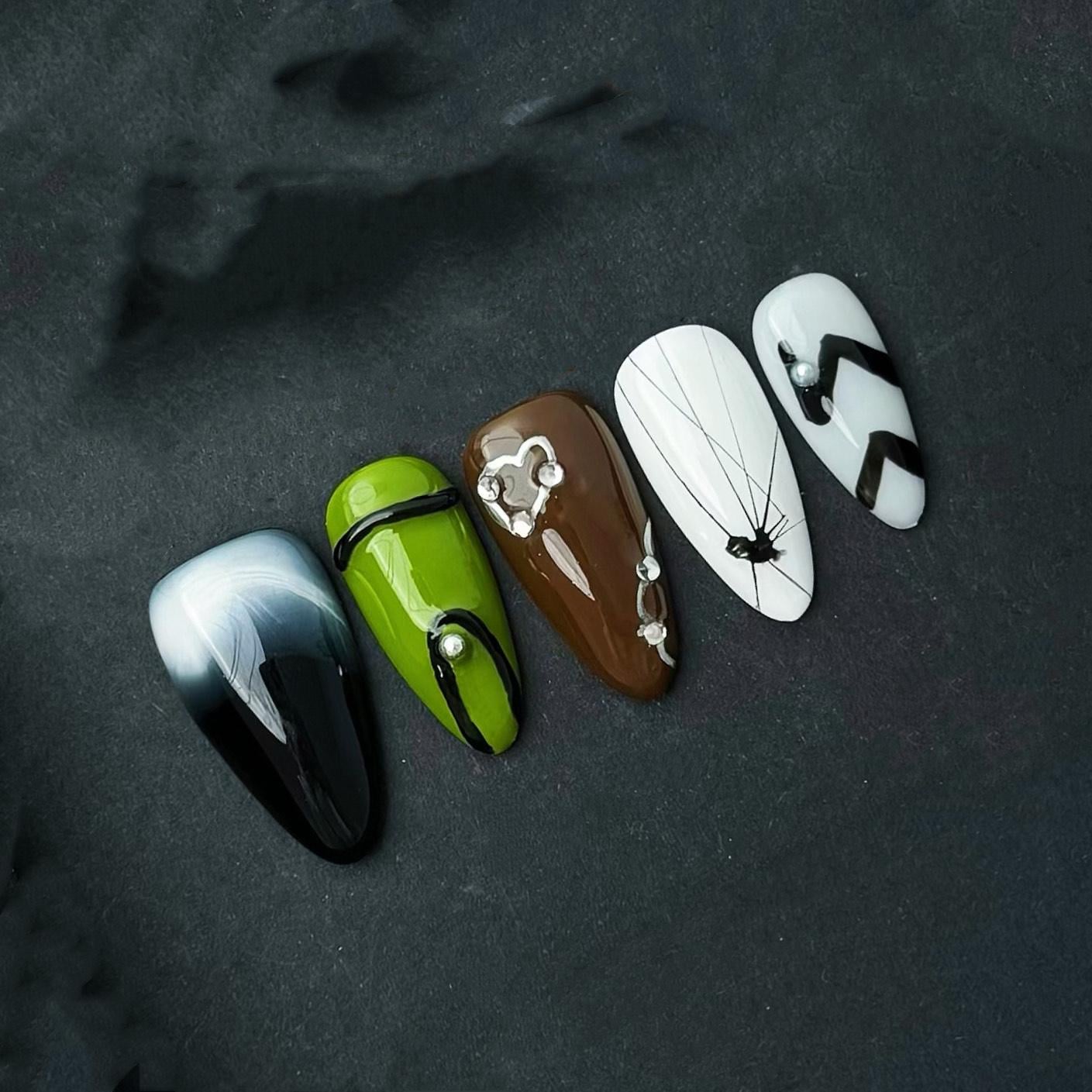 Edgy Mixed Design Nails Black Ombre Green Brown Spider Web and Abstract Accents. Artificial reusable fake glue on faux manicure nails art.