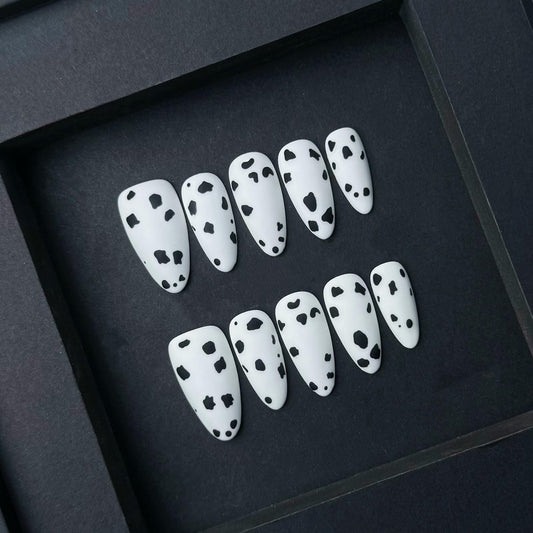 Matte Cow Print Press On Nails Black and White Spotted Animal Design. Artificial reusable fake glue on faux manicure nails trendy art.
