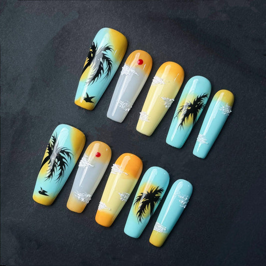 Tropical Sunset Palm Tree Press On Nails with Clouds Birds and Sun Accent. Artificial reusable fake glue on faux manicure nails trendy art.