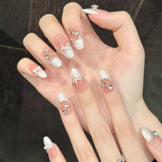 3D Lace French Press On Nails with Pink Bows Heart Charms and Crystals. Artificial reusable fake glue on faux manicure nails trendy art.
