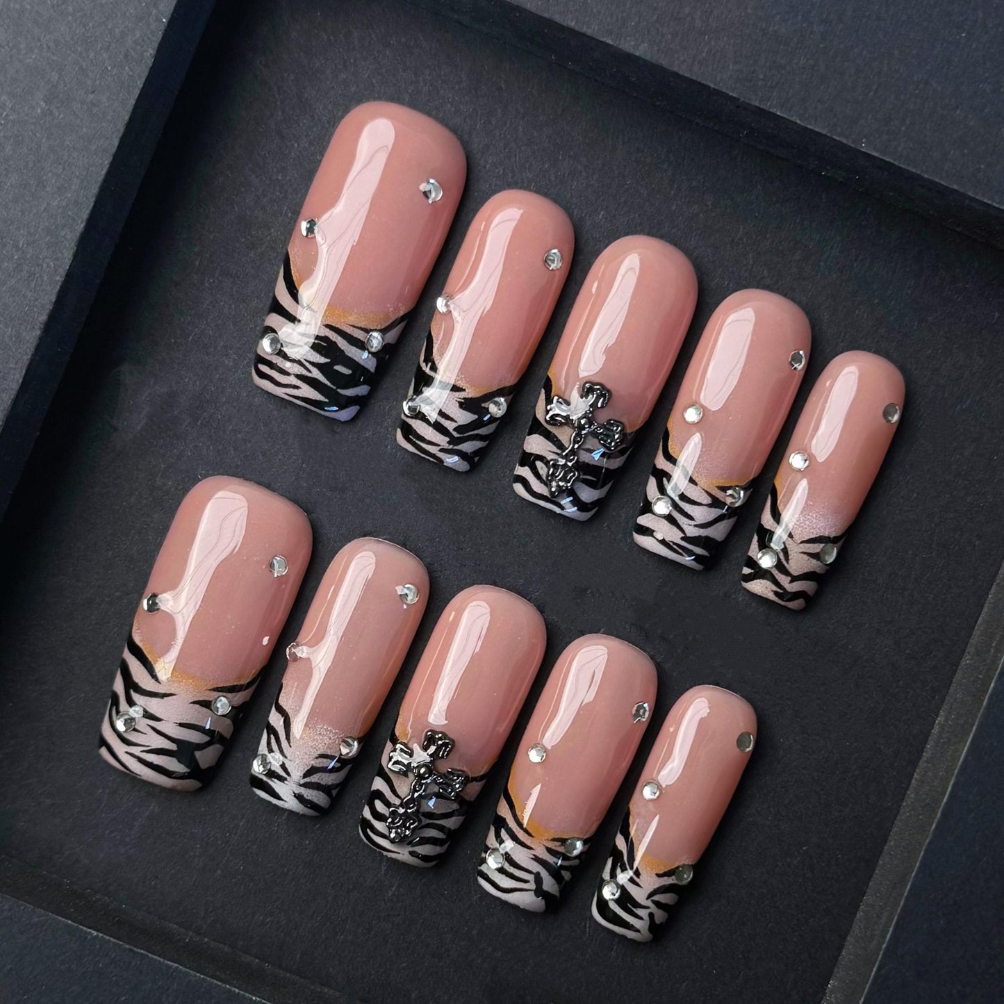 Zebra French Tip Press On Nails with Rhinestones and Gothic Cross Accent Artificial reusable fake glue on faux manicure nails trendy art