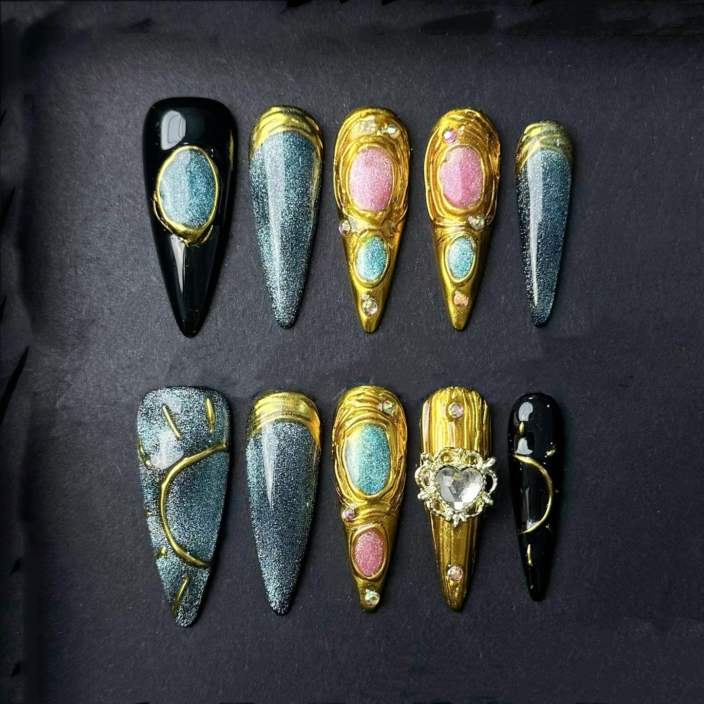 Celestial Metallic Galaxy Press-On Nails with Gold Sculpted Detail and Gem Accents. Artificial reusable fake glue on faux manicure nail art.