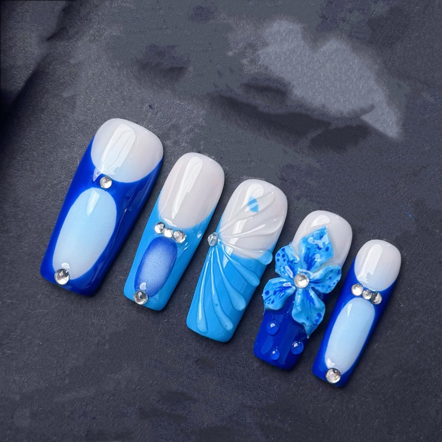 Blue Blossom Press-On Nails with Rhinestones and 3D Floral Accents. Artificial reusable fake glue on faux manicure nails trendy art.