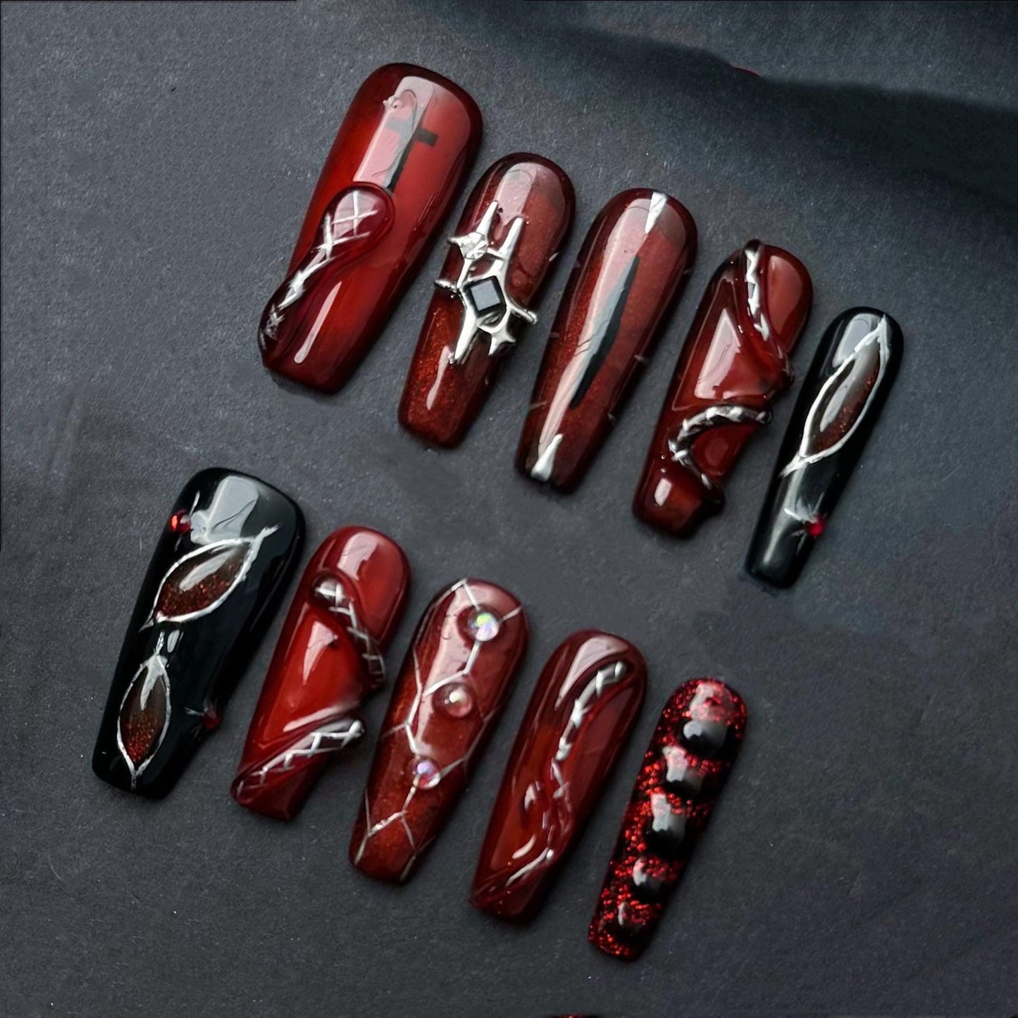 Deep Red and Black Gothic Press-On Nails with Chrome & Crystal Accents. Artificial reusable fake glue on faux manicure nails trendy art.