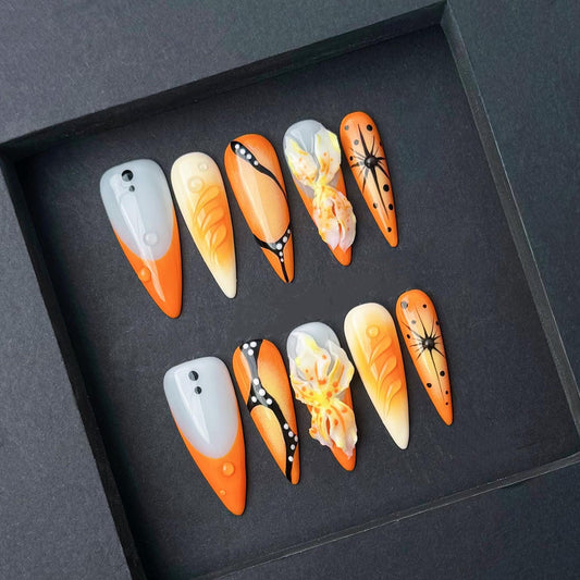 Monarch Butterfly Press-On Nail with 3D Flower Accents in Orange and Cream. Artificial reusable fake glue on faux manicure nails trendy art.