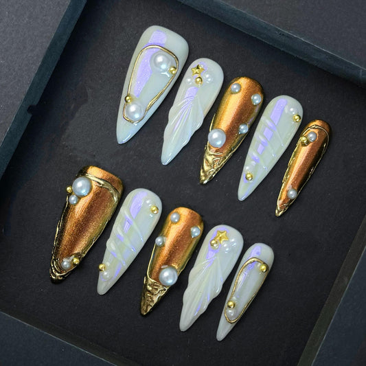 Iridescent Pearl & Gold Foil Press-On Nails with 3D Star and Shell Accents. Artificial reusable fake glue on faux manicure nails trendy art.