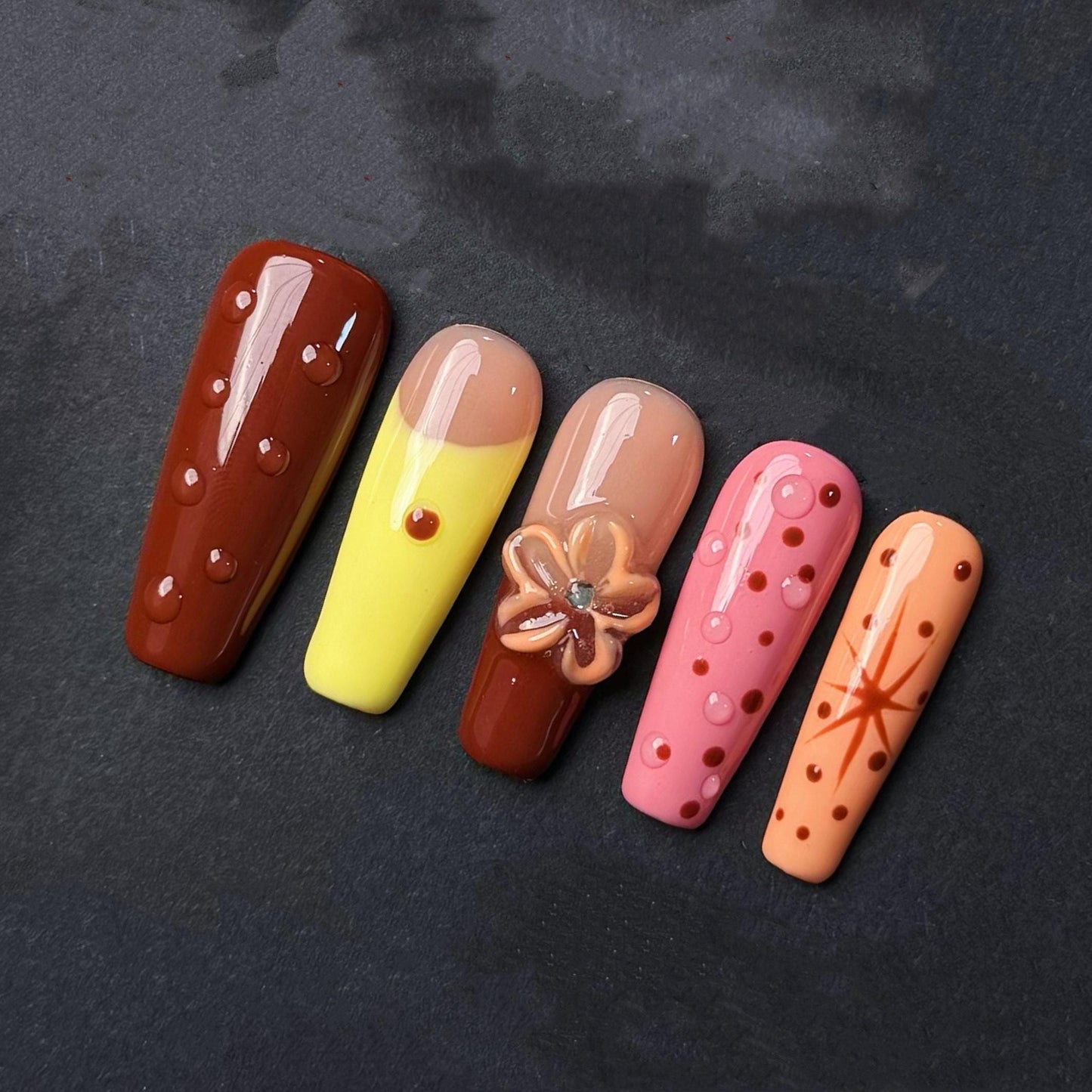 Retro Polka Dot Press-On Nails with 3D Flower and Sunset Tones. Artificial reusable fake glue on faux manicure nails trendy art.