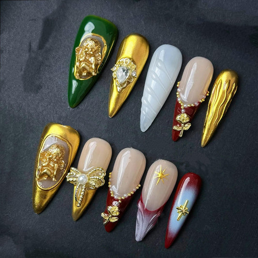 Baroque Gold Angel Press On Nails – Red Green Nude Stiletto Set with 3D Charms & Pearl Accents. Artificial faux manicure nails trendy art.